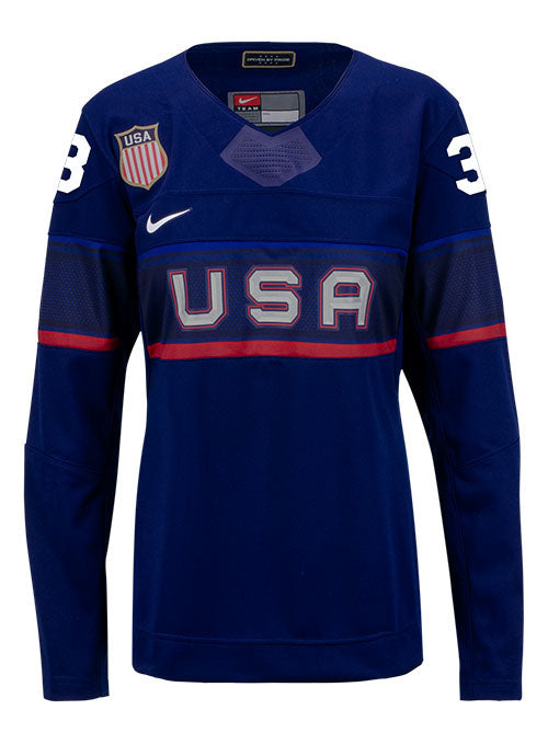 Ladies Nike USA Hockey Cayla Barnes Away 2022 Olympic Jersey in Blue - Front View